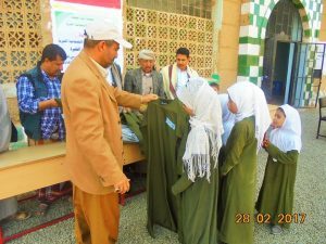 The project of distributing school uniforms in basic schools in the Saada